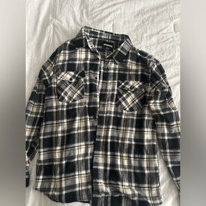 men’s black-and-white flannel.